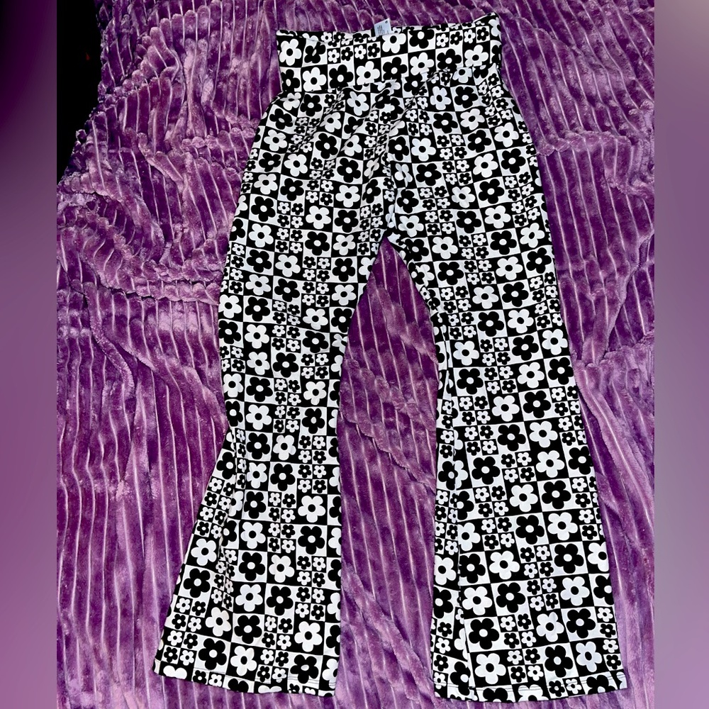 Black and white ‘Wild Fable’ flared pants. They’re M but run large!